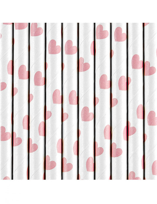 Gros plan sur les motifs de cœurs roses des pailles en carton Saint-Valentin