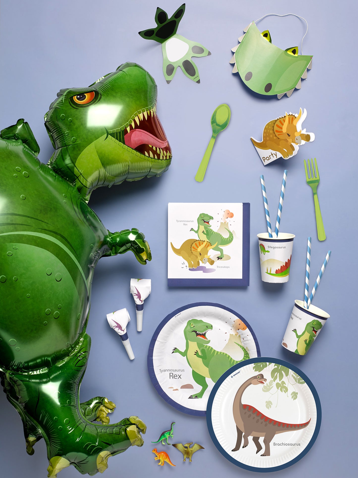 Mise en scène de la collection d'articles de fête des assiettes en carton grands dinosaures pour anniversaire
