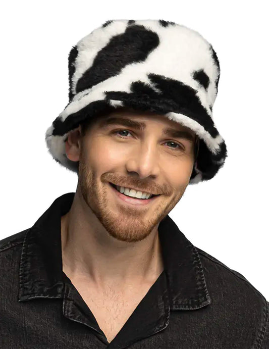 Vue de face du bob en peluche vache