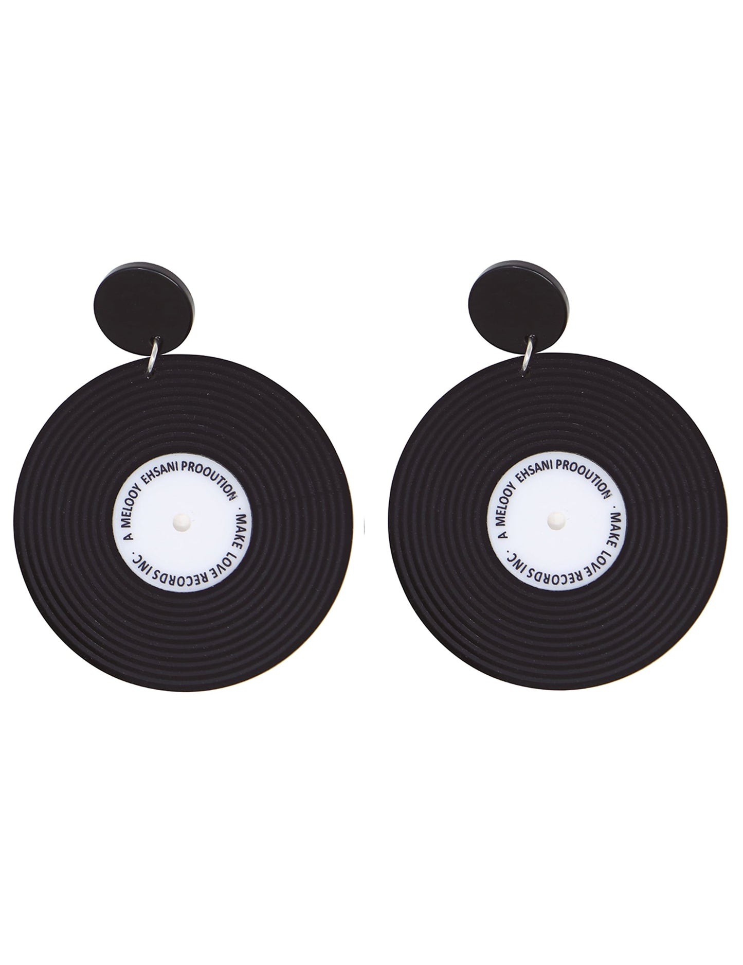 Gros plan sur la paire de boucles d'oreilles disques vinyles rétro