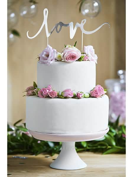 Elrendezés tortára, love tortadíszítő pálcával