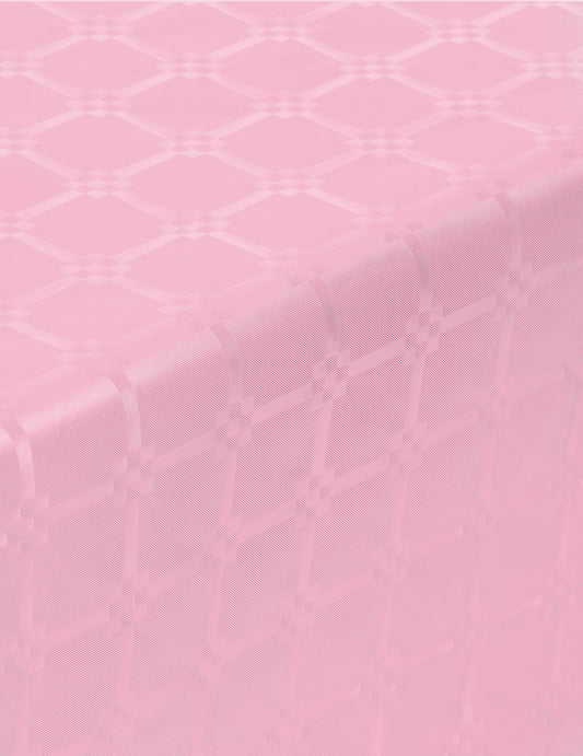 Détail des motifs de la nappe en rouleau papier damassé rose pastel