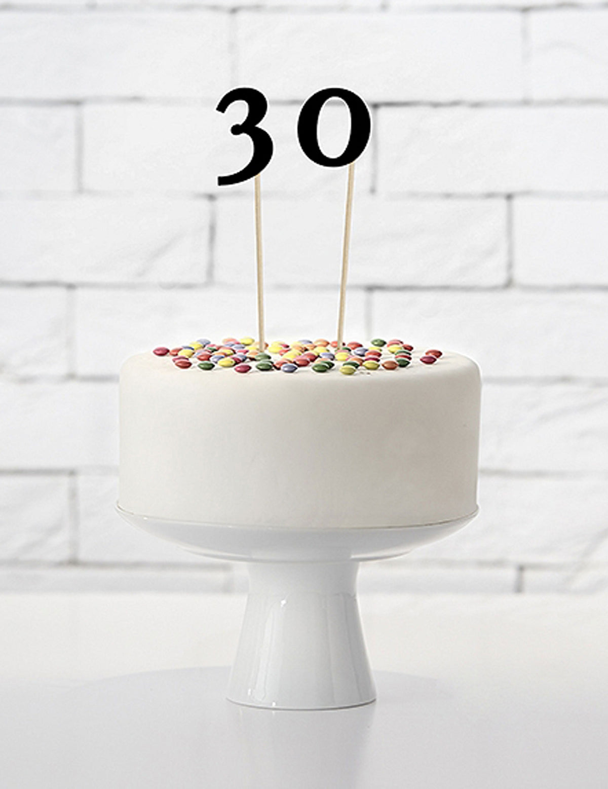 Mise en situation sur un gâteau du 10 chiffres sur pic pour fête
