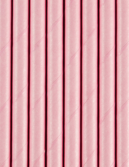 Gros plan sur la texture des pailles en carton rose clair pour fête
