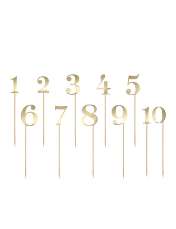 11 asztali jelölő tüskéken, arany számok 0-tól 10-ig