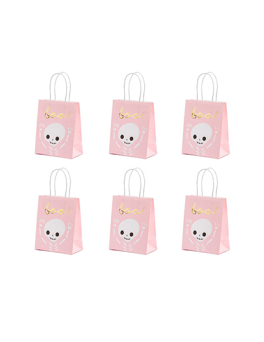 Sacs à bonbons boo pour Halloween roses et blancs avec motif squelette