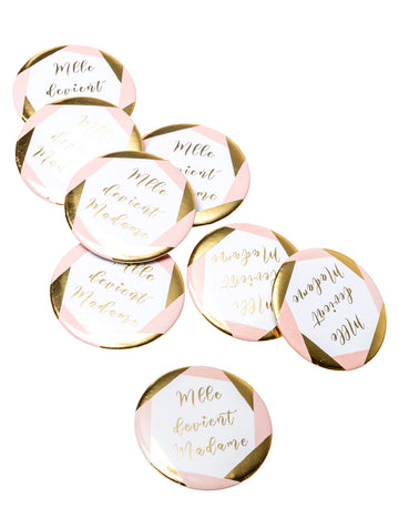 Badge-ek „Mademoiselleből madame lesz” rózsaszín és arany menyasszonybúcsúra