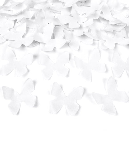 Gros plan sur les confettis du canon à confettis papillons blancs