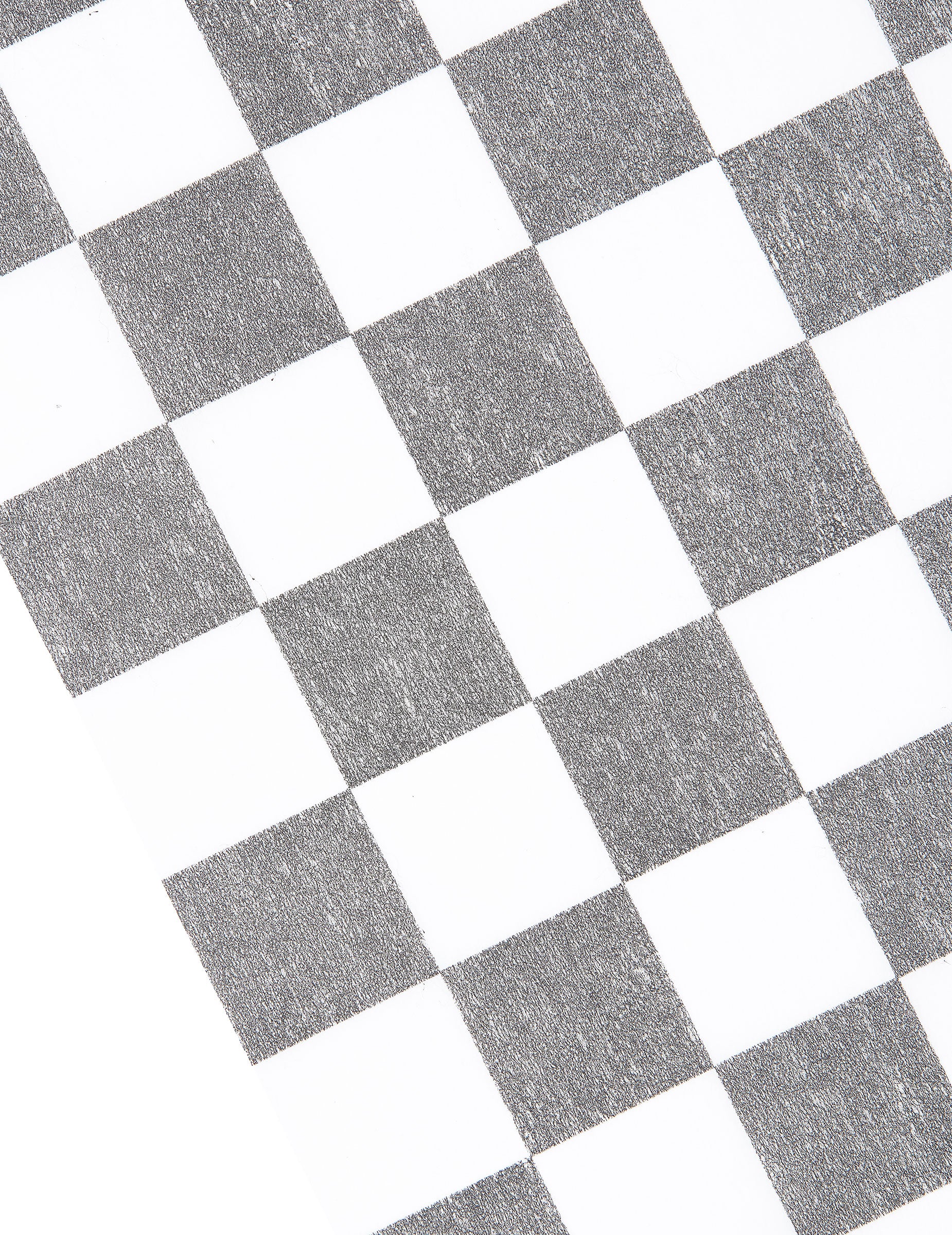 Détail du motif du chemin de table intissé damier