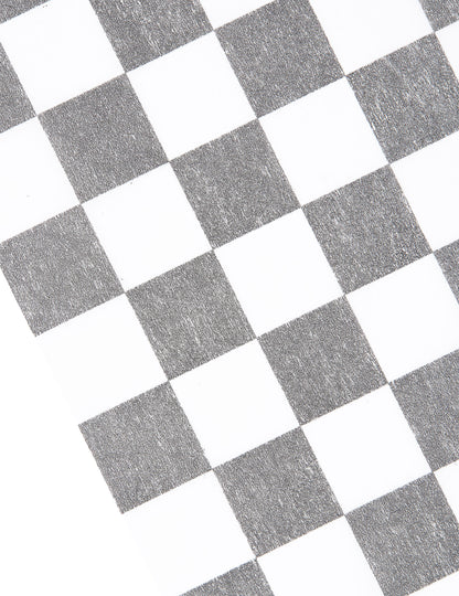 Détail du motif du chemin de table intissé damier