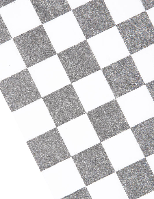 Détail du motif du chemin de table intissé damier
