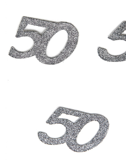 Közelkép a 50 éves születésnapi konfetti csillámos textúrájáról