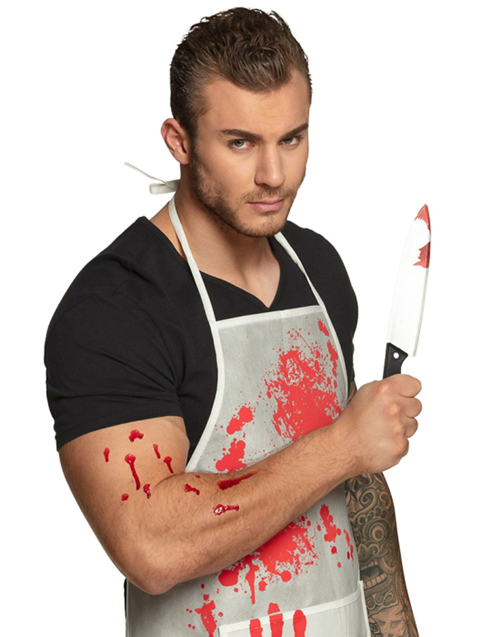 Couteau ensanglanté tenu en main du couteau plastique Halloween