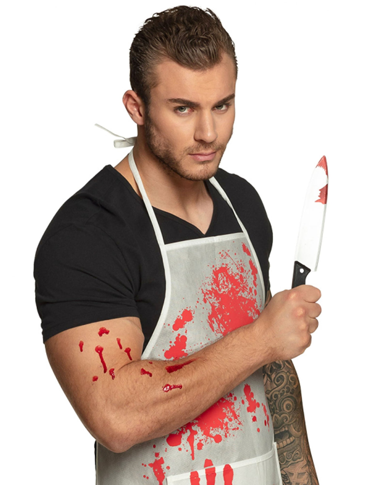 Couteau ensanglanté tenu en main du couteau plastique Halloween