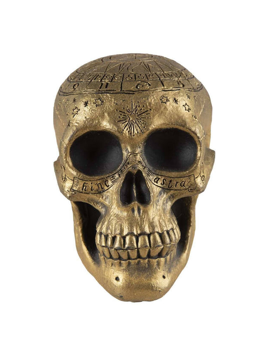 Vue de face du crâne de squelette avec pentagramme doré