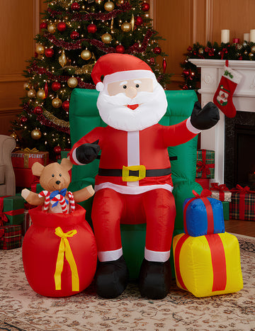 Animált, felfújható karácsonyi dekoráció – ülő Mikulás ajándékokkal 122 cm 