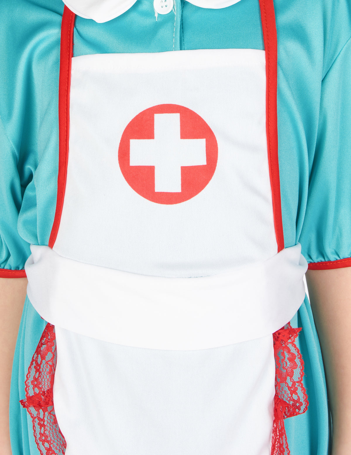 Gros plan sur le tablier avec croix rouge du déguisement d'infirmière pour fille