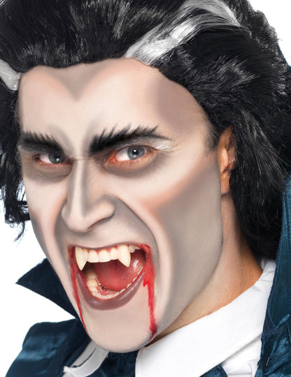 Felnőtt Halloween vámpír műfogsor fehér, hegyes szemfogakkal és véreddel