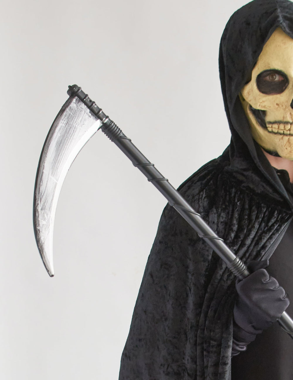 Détail de la lame de la faux en plastique Halloween