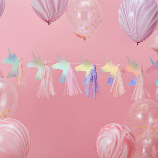 Guirlande en papier et tassel Licorne pour fête iridescente avec pompons roses et violets