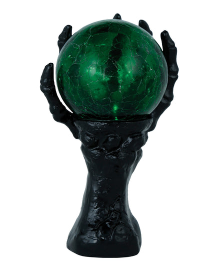 Fekete csontvázkéz világító kristálygömbbel