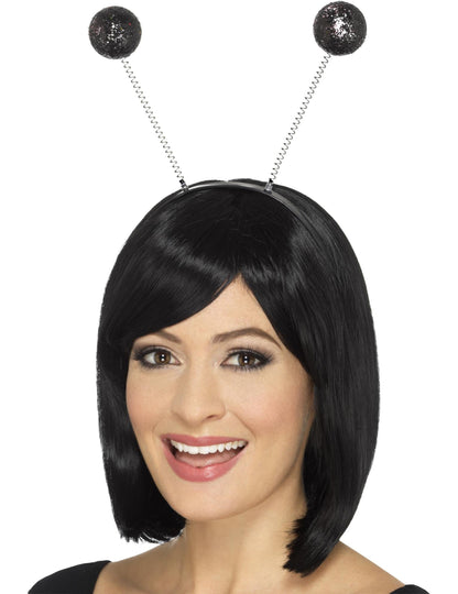 Vue portée du serre-tête boules paillettées pour adulte noires