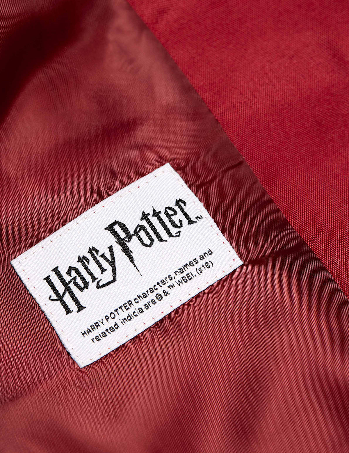 Détail de l'étiquette Harry Potter de la veste Mrs. Gryffondor pour femme Suitmeister
