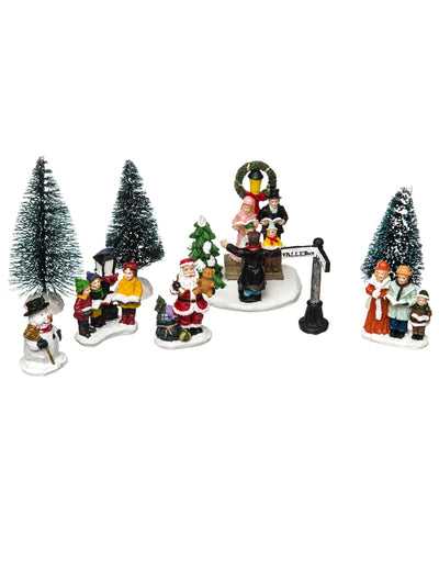 Santons de village de noël chorale du père noël pour décoration multicolore avec sapins et bonhomme de neige
